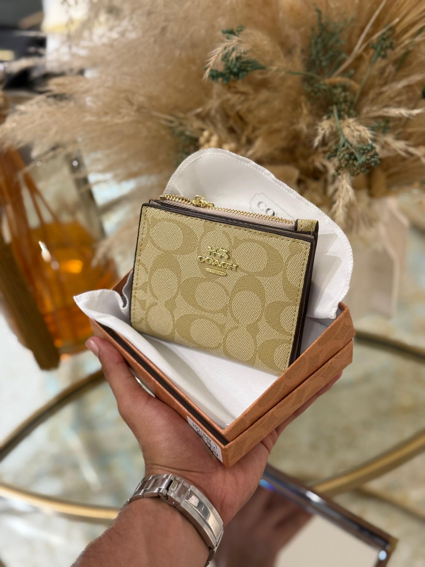 Portefeuille COACH à bouton-pression