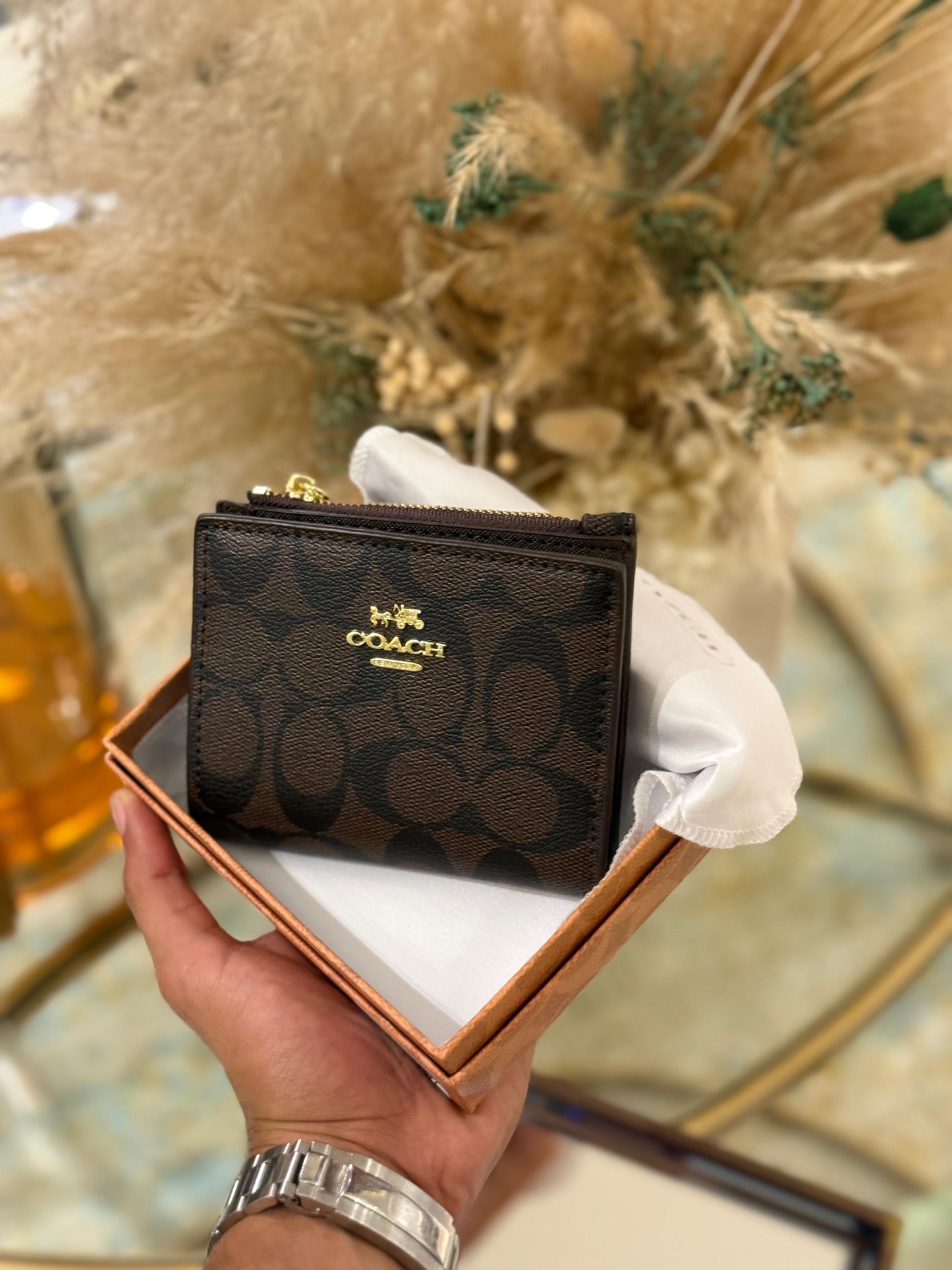 Portefeuille COACH à bouton-pression